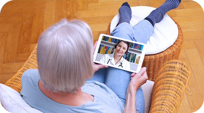 Top view of elderly lady in a video call with doctor to discuss condition and prevent unnecessary hospital readmission saving travel time and costs