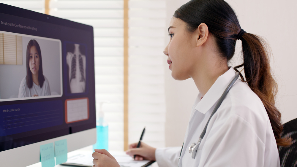 Female doctor virtually consulting COPD patient