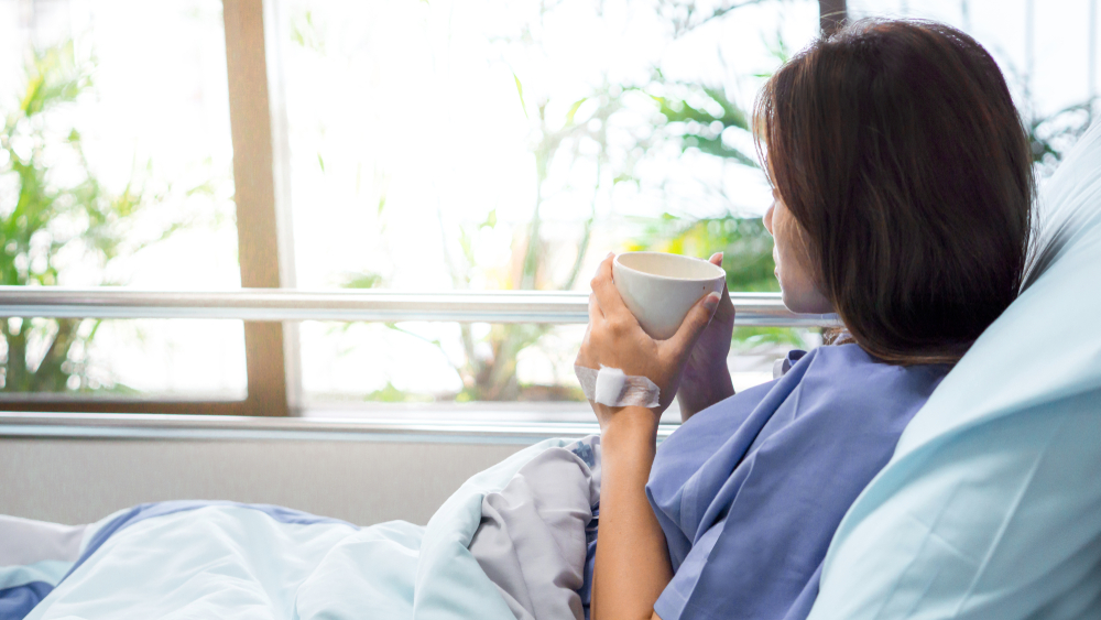 Illness,Asia,Patient,Women,And,Hospital,Concept,-,Illness,Asian patient looking out window