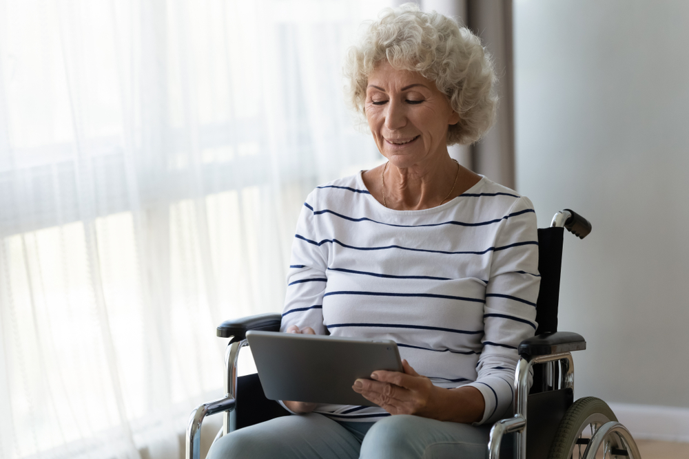 Happy,Disabled,Handicapped,Senior,Adult,Retired,Woman,Sit,On,Wheelchair
